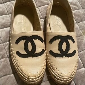 CHANEL Cream Espadrilles with Black Emblem